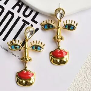 NWT surrealist style earrings eyes ears and nose pierced